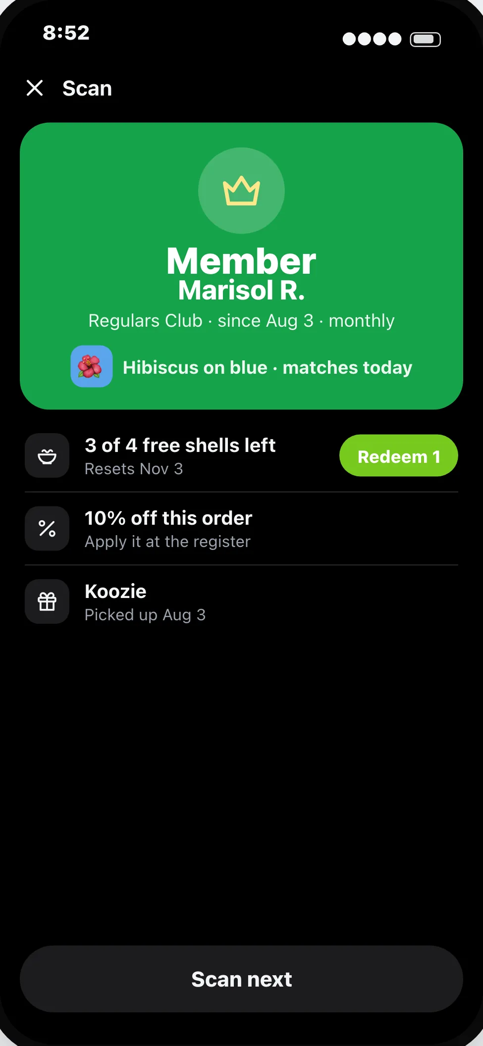 A kavatender scanning a member: free shells left and Redeem.